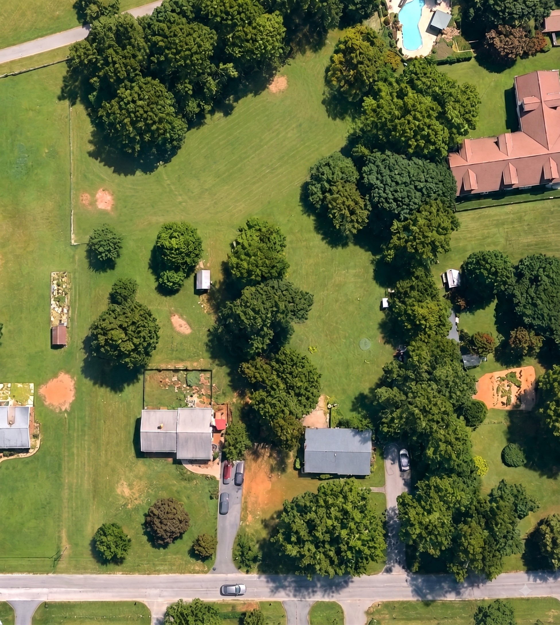Raw aerial photo of the Lot 75 parcel before development
